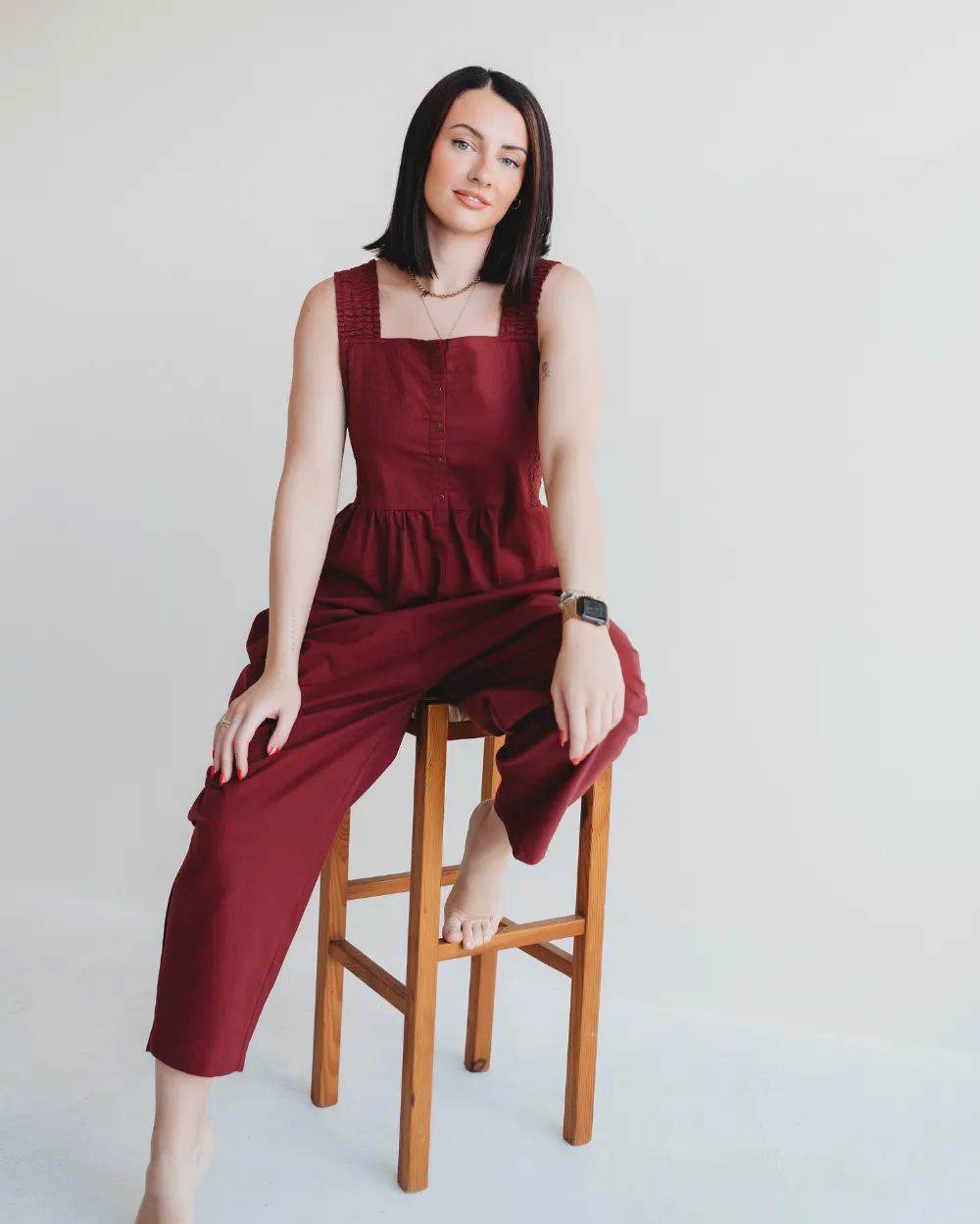 WaterRepellent Finish LayeredPanels Alice Red Smocking Strap Jumpsuit