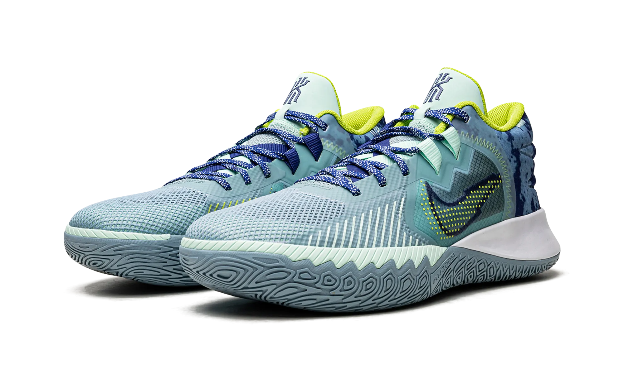 Kyrie Flytrap V Adaptive Cushioning Tech running in a park trail