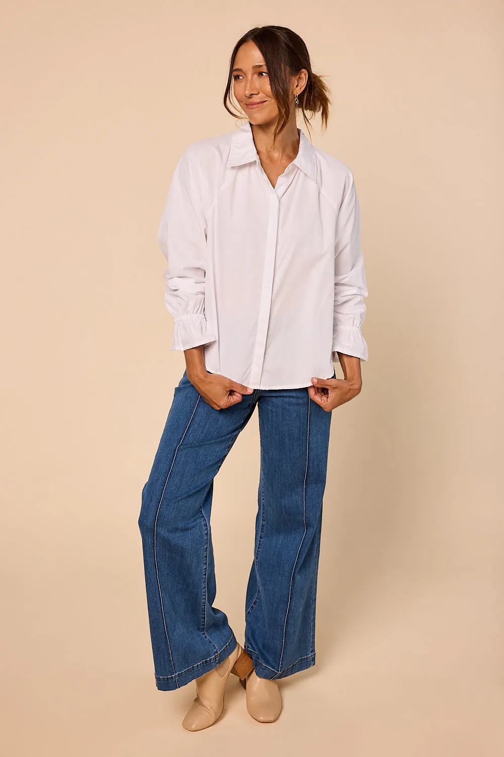 Ebony Frill Cuff Top in White Versatile Wardrobe Piece Casual Performance Fit