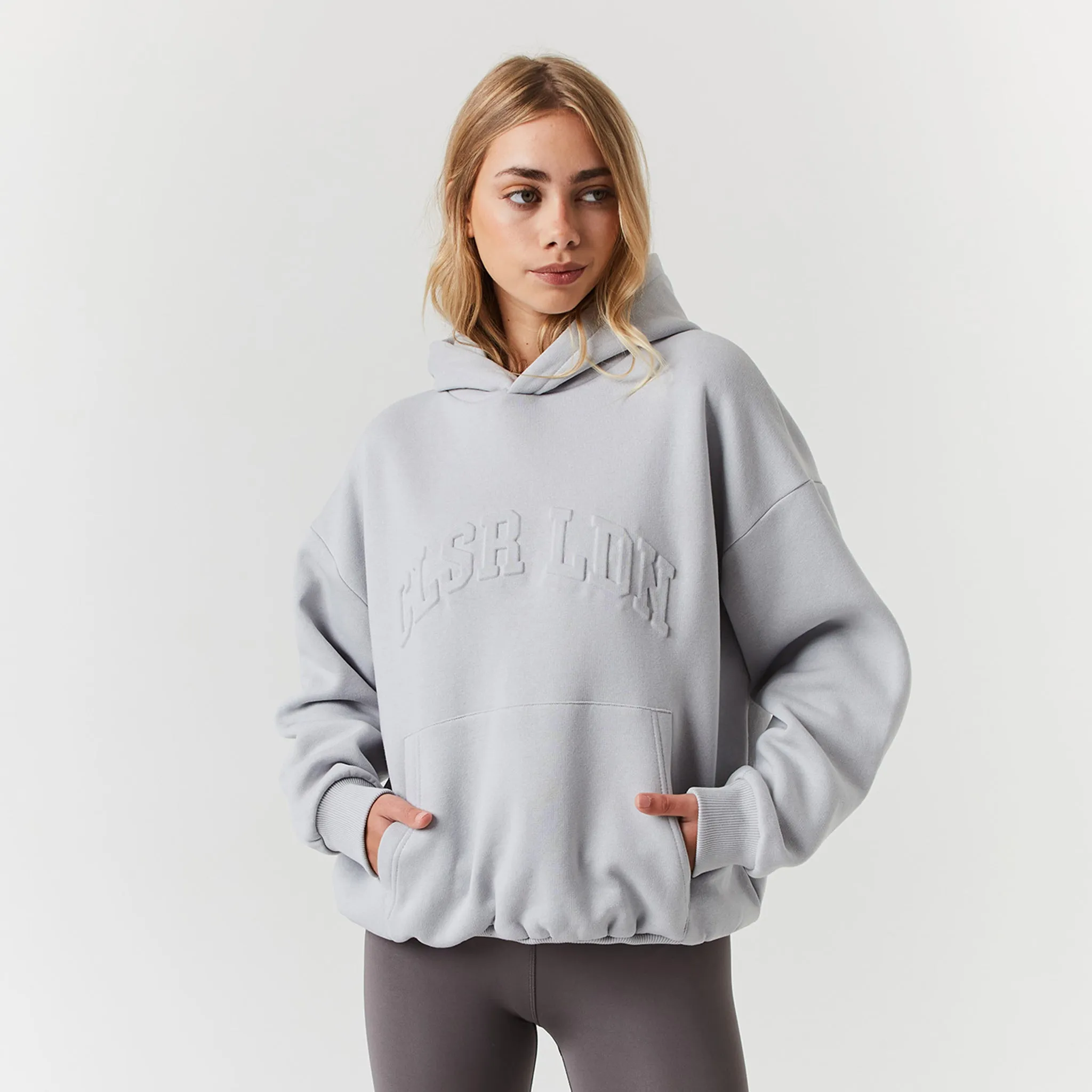Embossed Varsity Hoodie | Ice Grey chain accents product mountain style allure