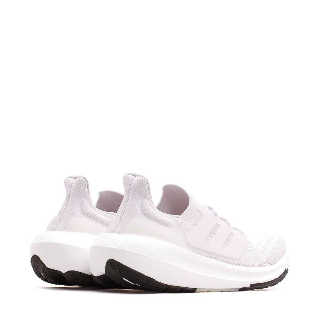 Adidas Running Women Ultraboost Light White GY9352 logo - branded running gear running in a meadow shoes