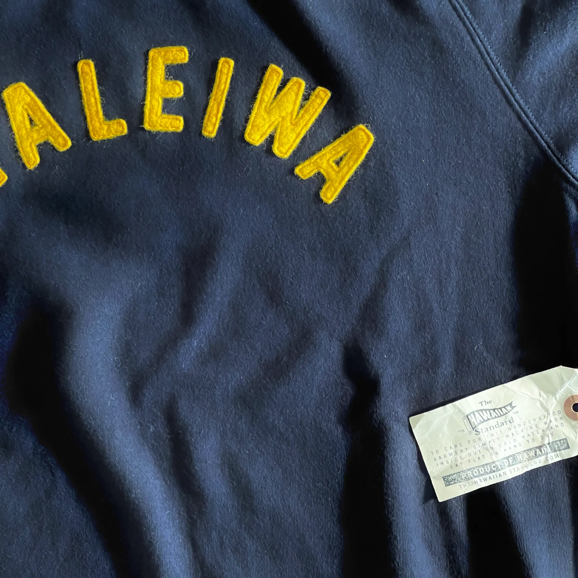 stain resistant coating Mens Raglan Fleece Navy x Haleiwa Gold applique