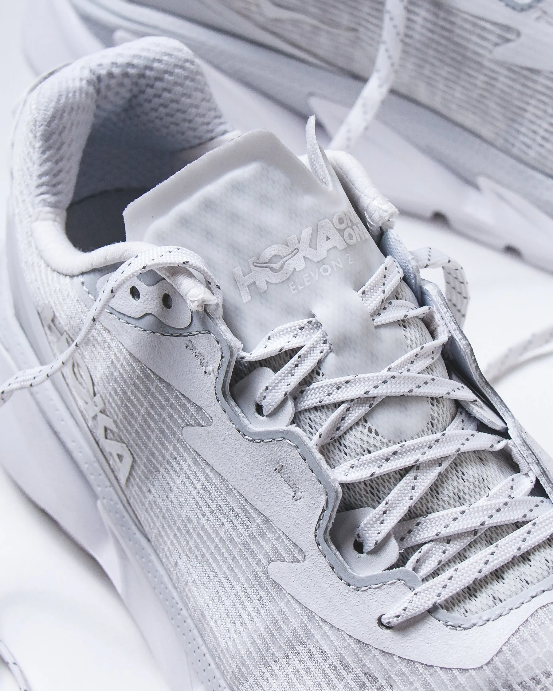 Stable construction Hoka One One Unisex Elevon 2 TS White Cosmic Grey 1165230-WMC