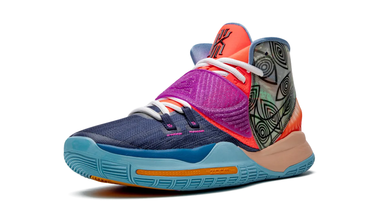 Amateur athlete running in a suburban area shoes Kyrie 6 Pre Heat "Heal The World"