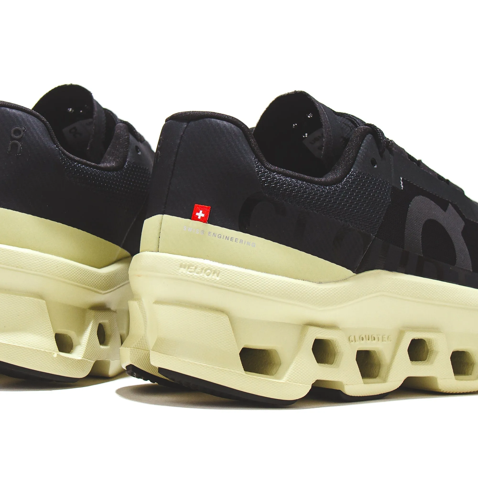 running in a cross - country meet shoes ON Men Cloudmonster Black 61.97727