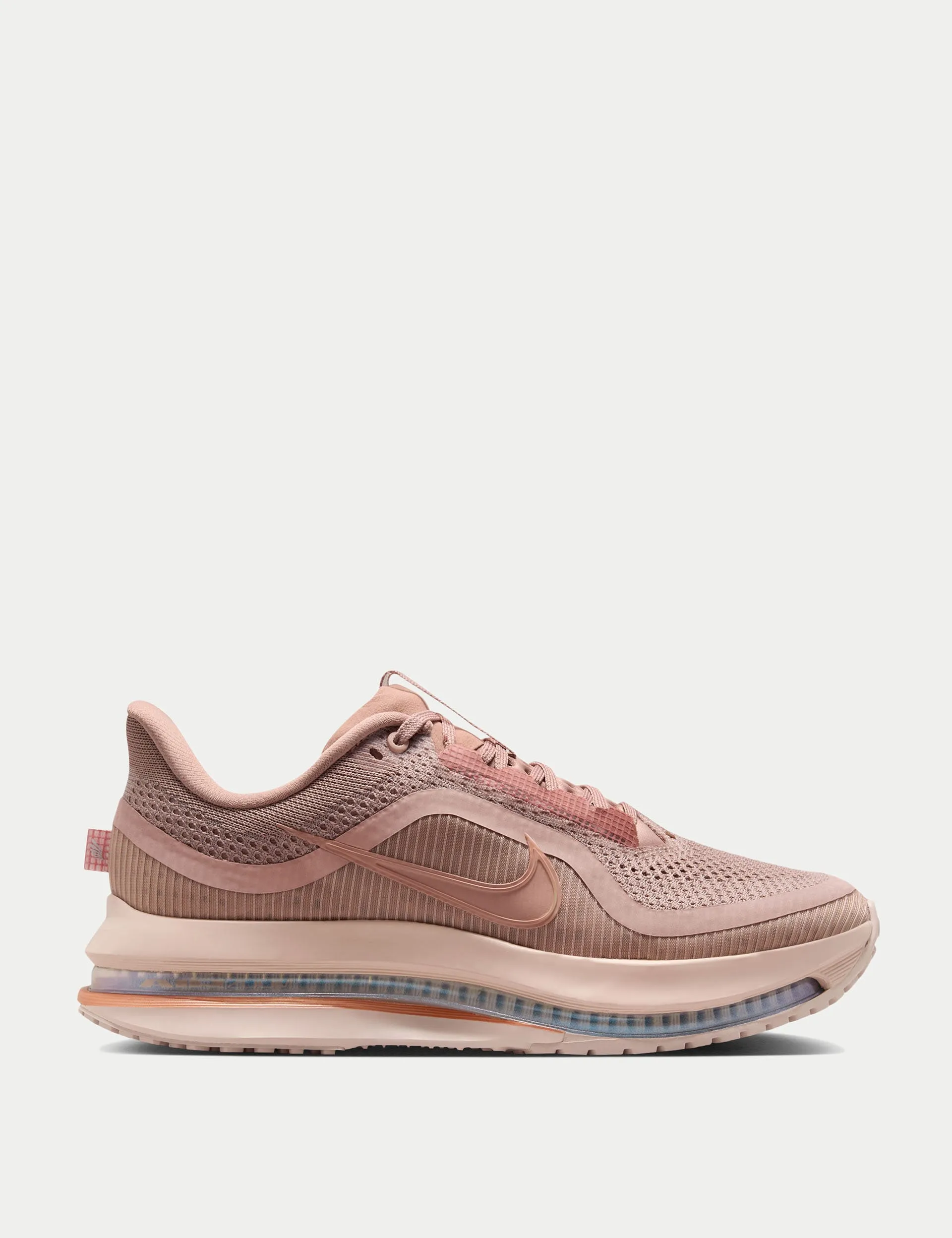 Pegasus Premium Shoes - Particle Pink/Metallic Rose Gold/Silt Red running in a historical site shoes