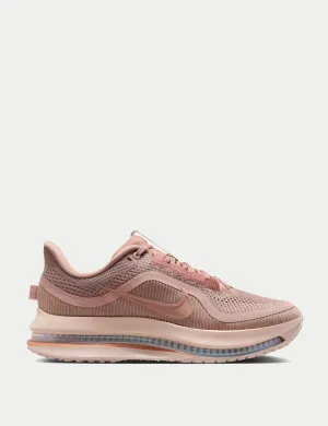 Pegasus Premium Shoes - Particle Pink/Metallic Rose Gold/Silt Red running in a historical site shoes