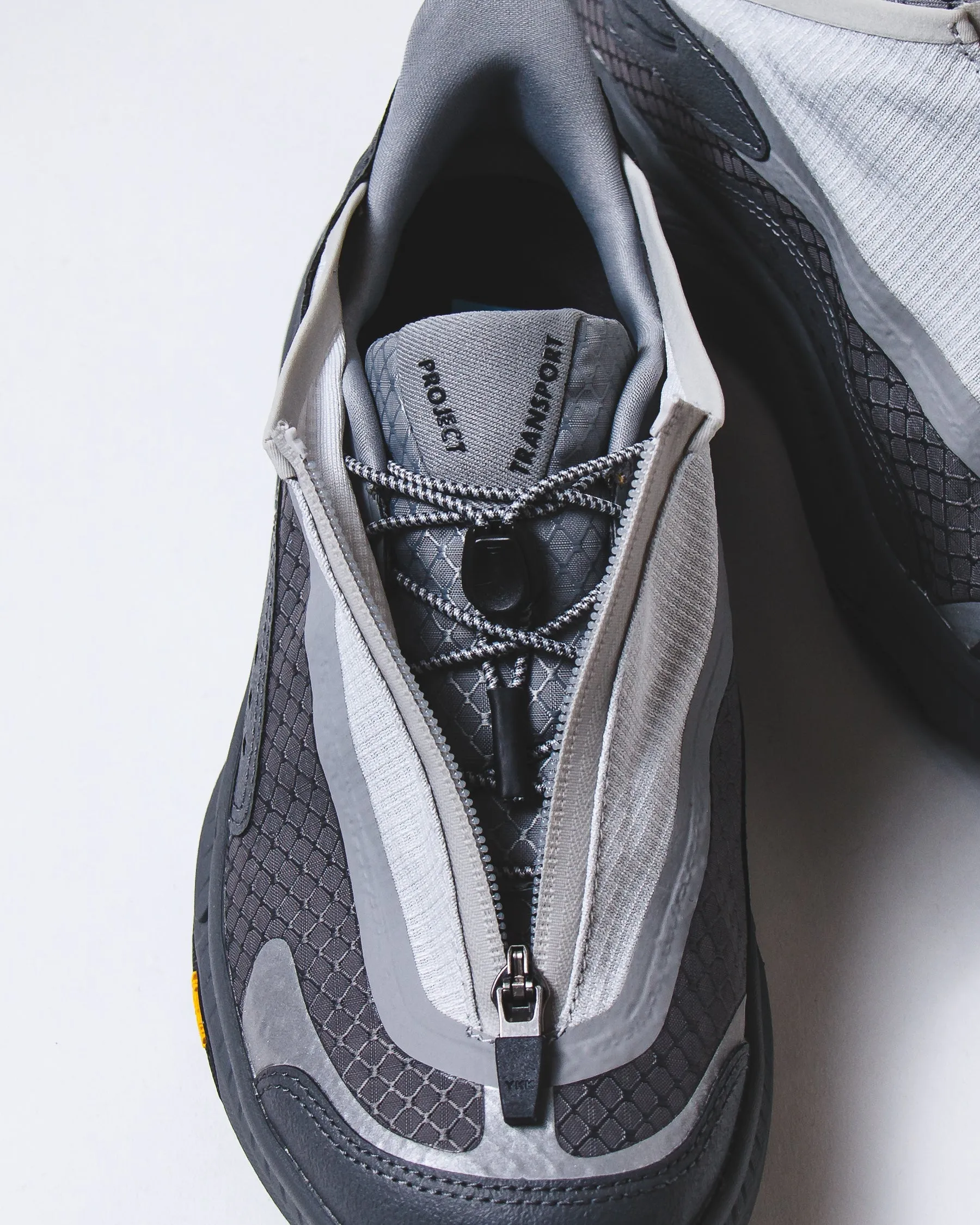 Hoka One One Unisex Project Transport Stardust Satellite Grey 1162850-SSTST running on a treadmill at home shoes